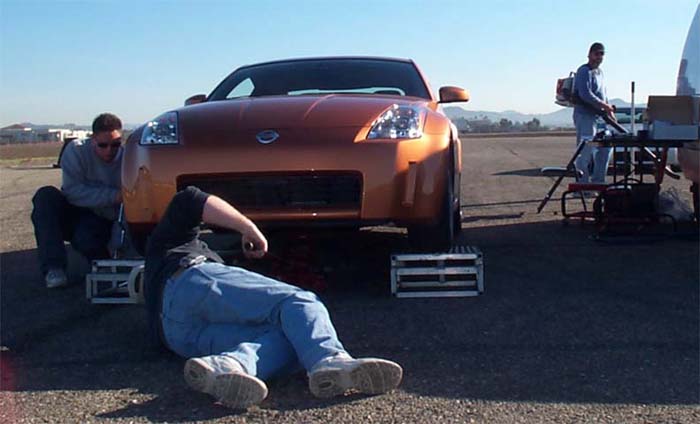 Pit crew goes to work on 350Z Track Model